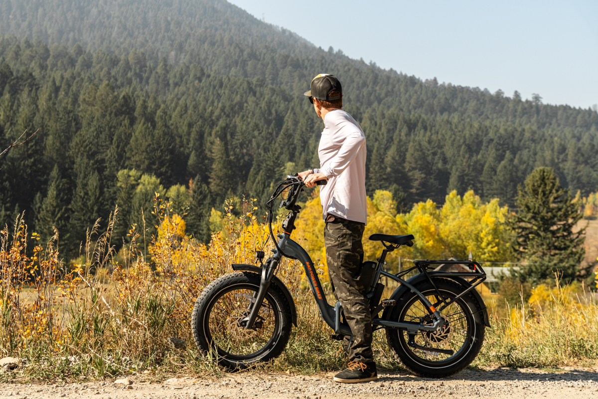 Man standing next to Rad electric bike