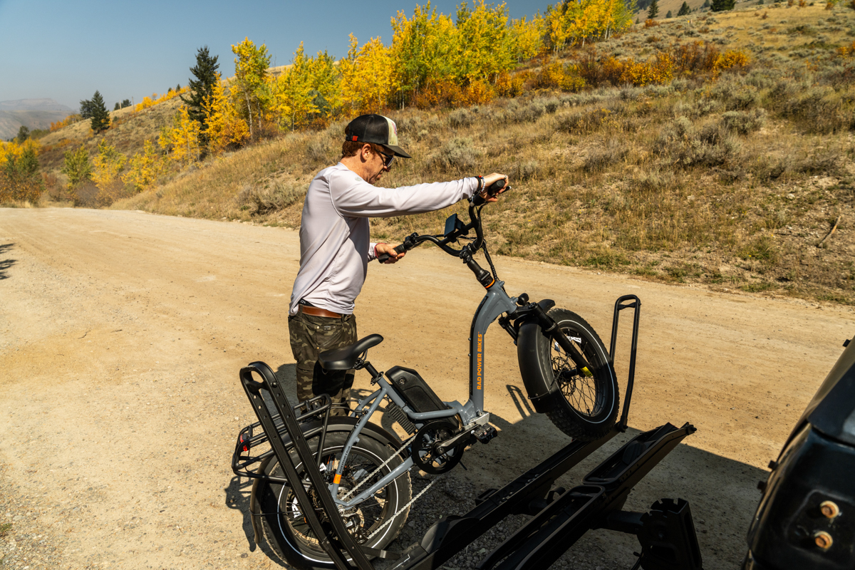 Man charging an electric bike