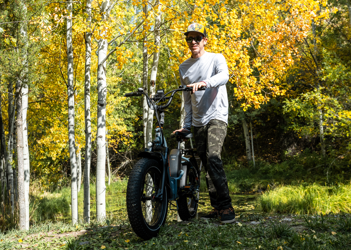 Man walking with an electric bike