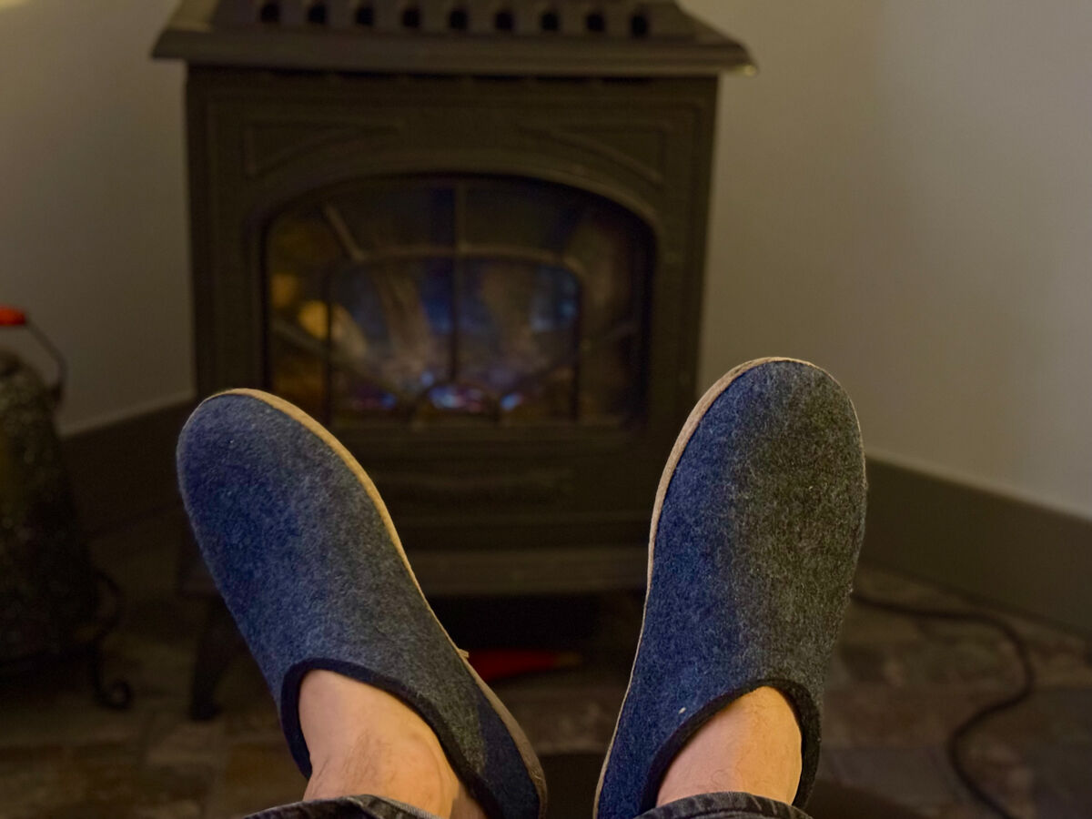 Wool Slippers Next to Fire Place