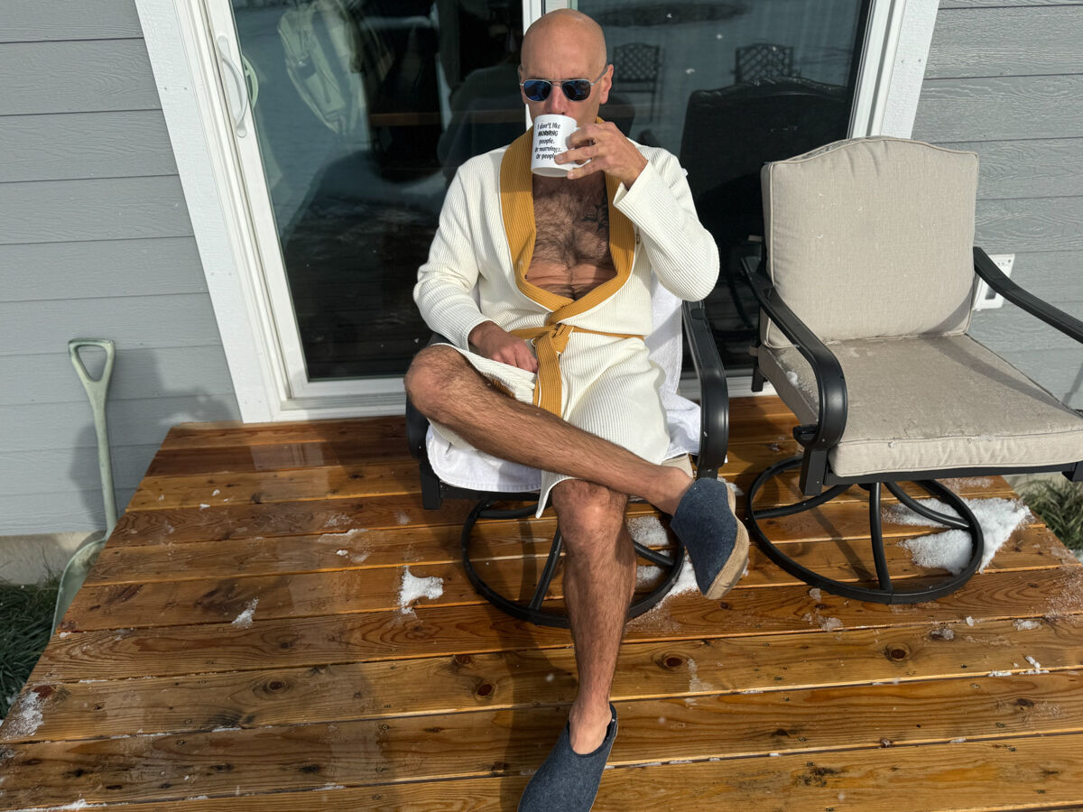 Man Sitting Outside with Wool Slippers