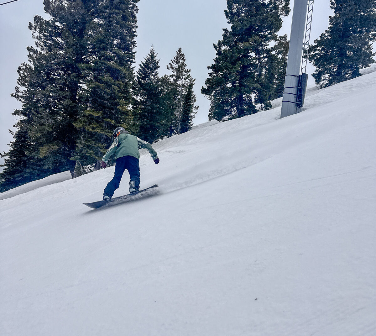 Man Snowboarding Fast