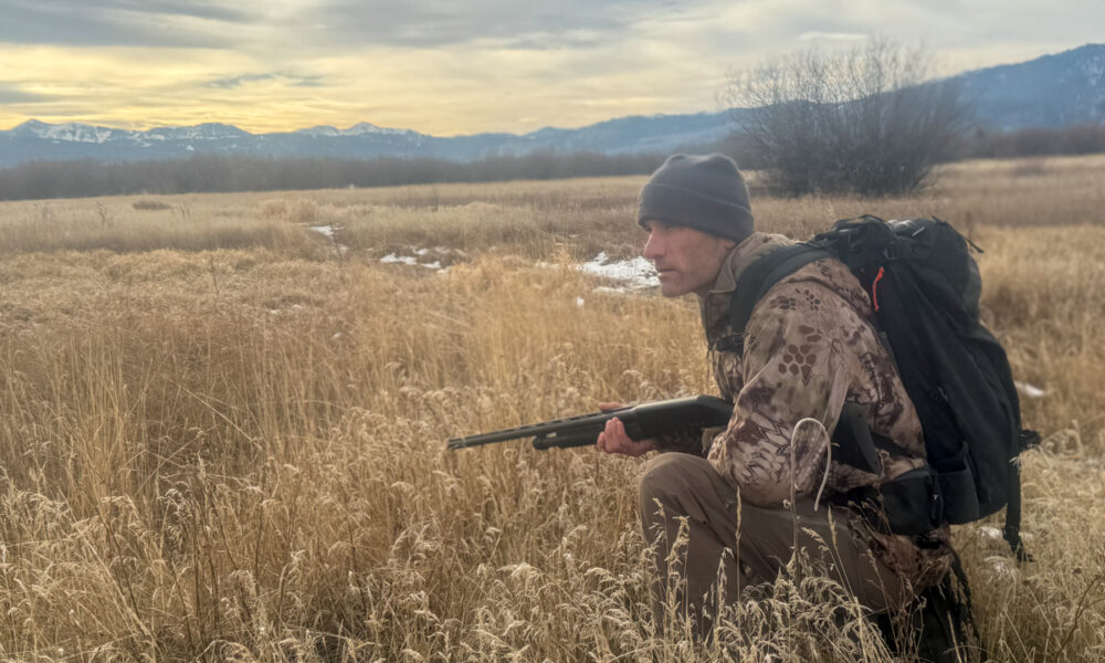 Man Using Kryptek Camo to Hunt