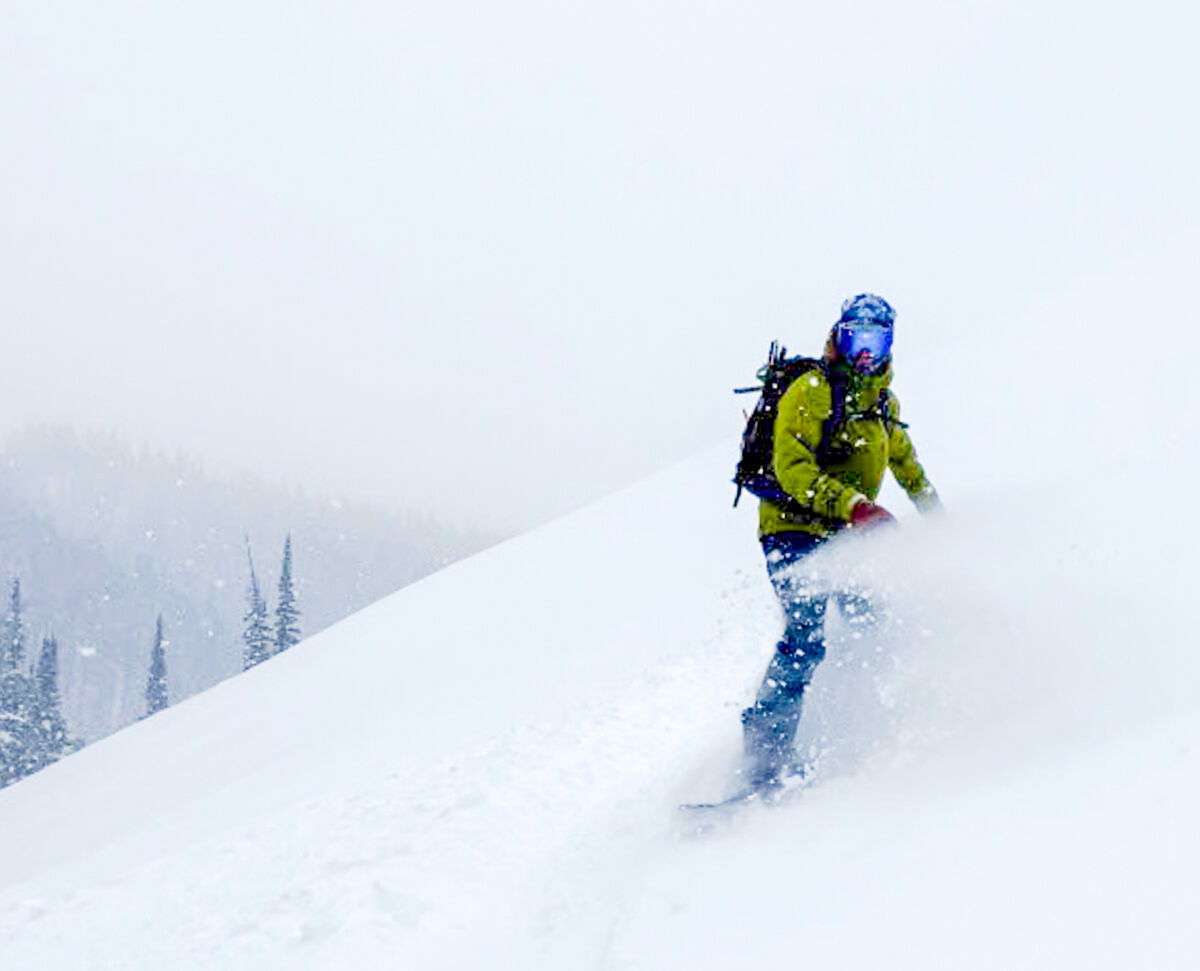Man Splitnboarding in Patagonia Pants