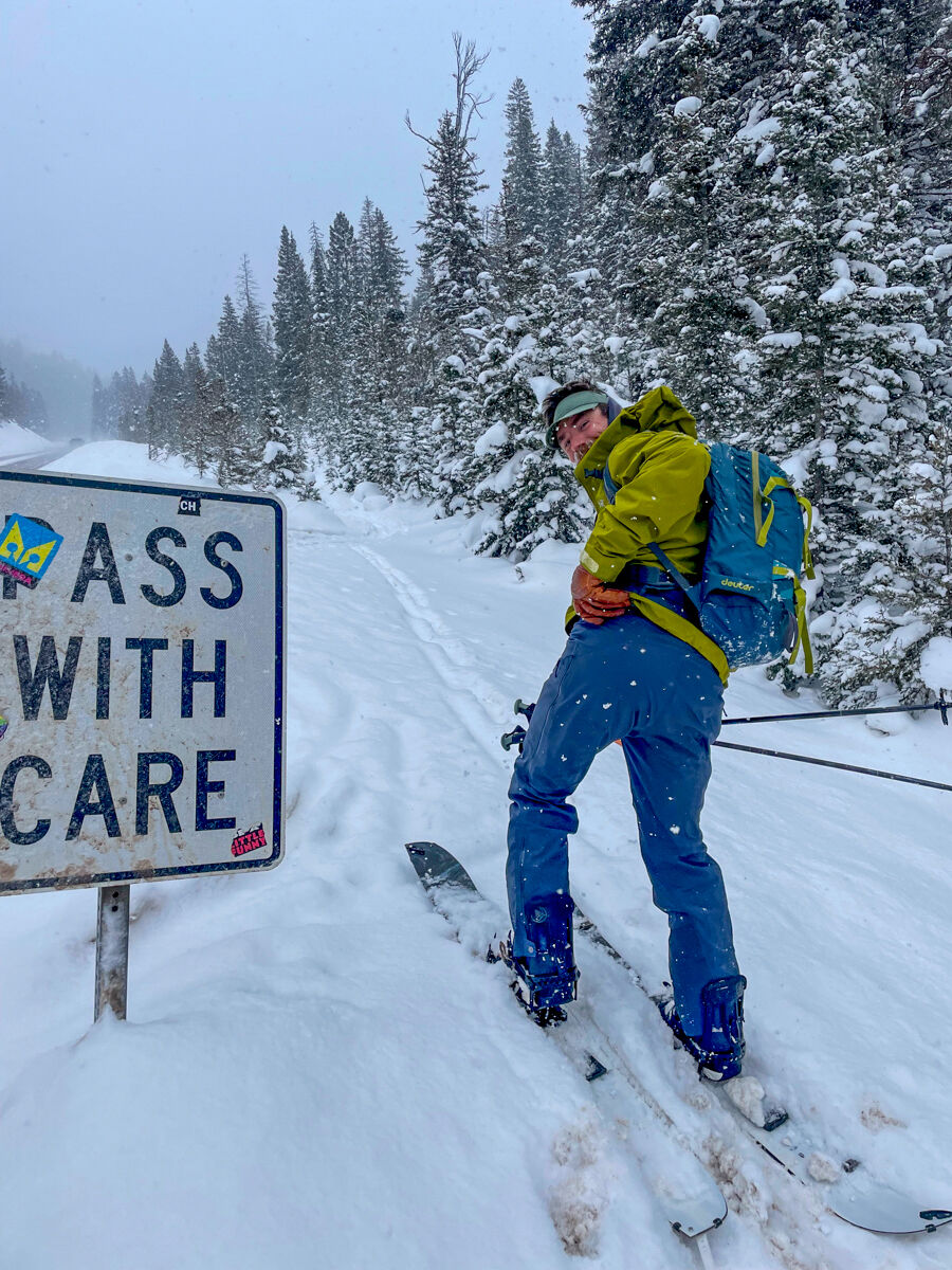 Man Splitboard Touring at Parking Lot