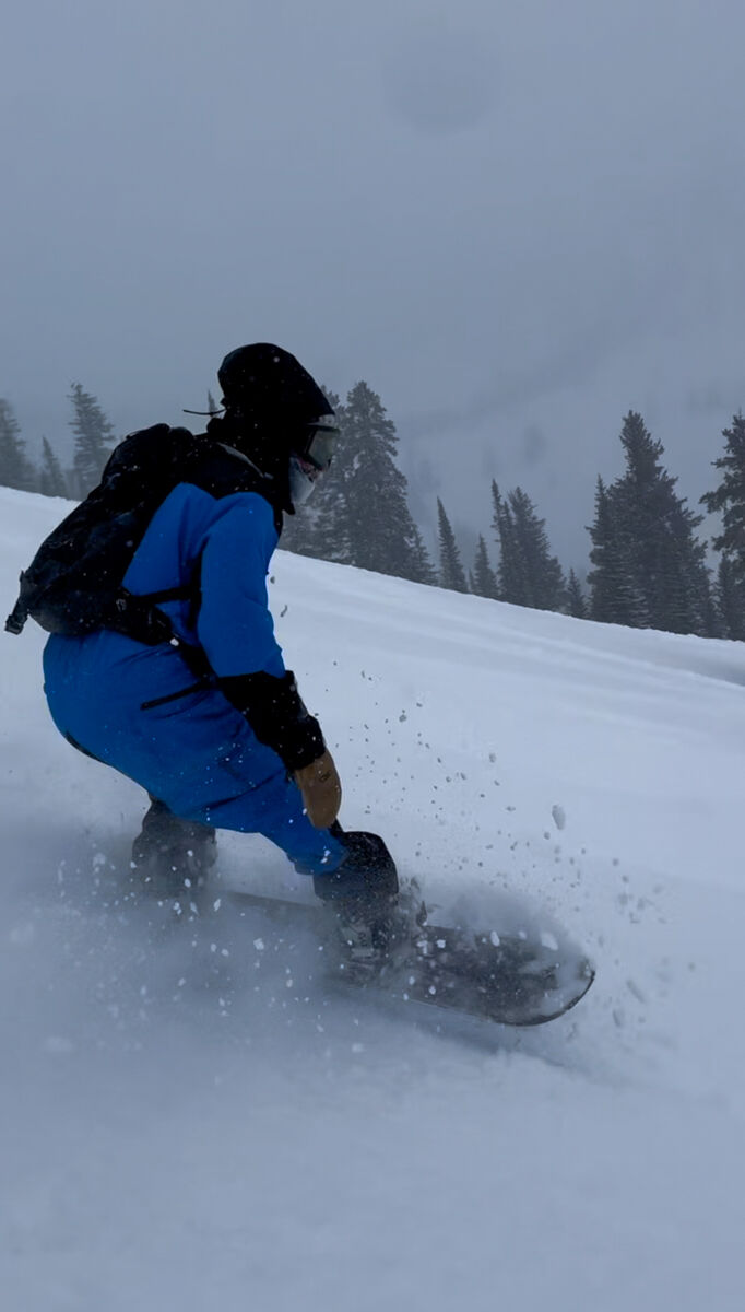 Snowboarder Ripping Powder