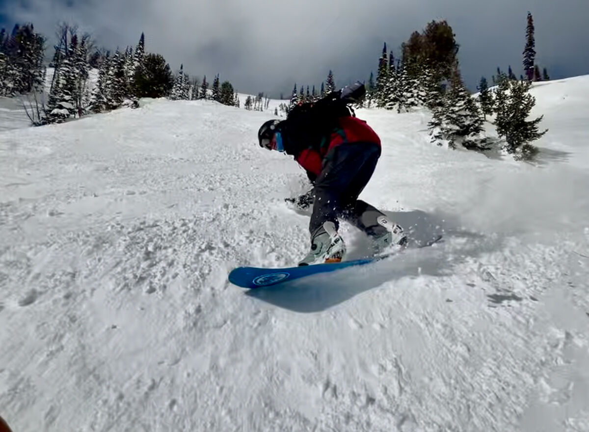 Man Making Snowboard Carve