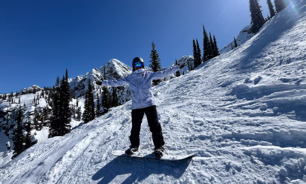 Man Wearing White Ski Jacket