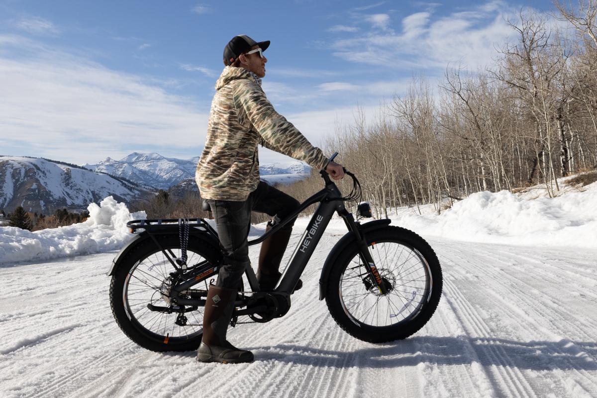 Man Riding E-Bike on Snow