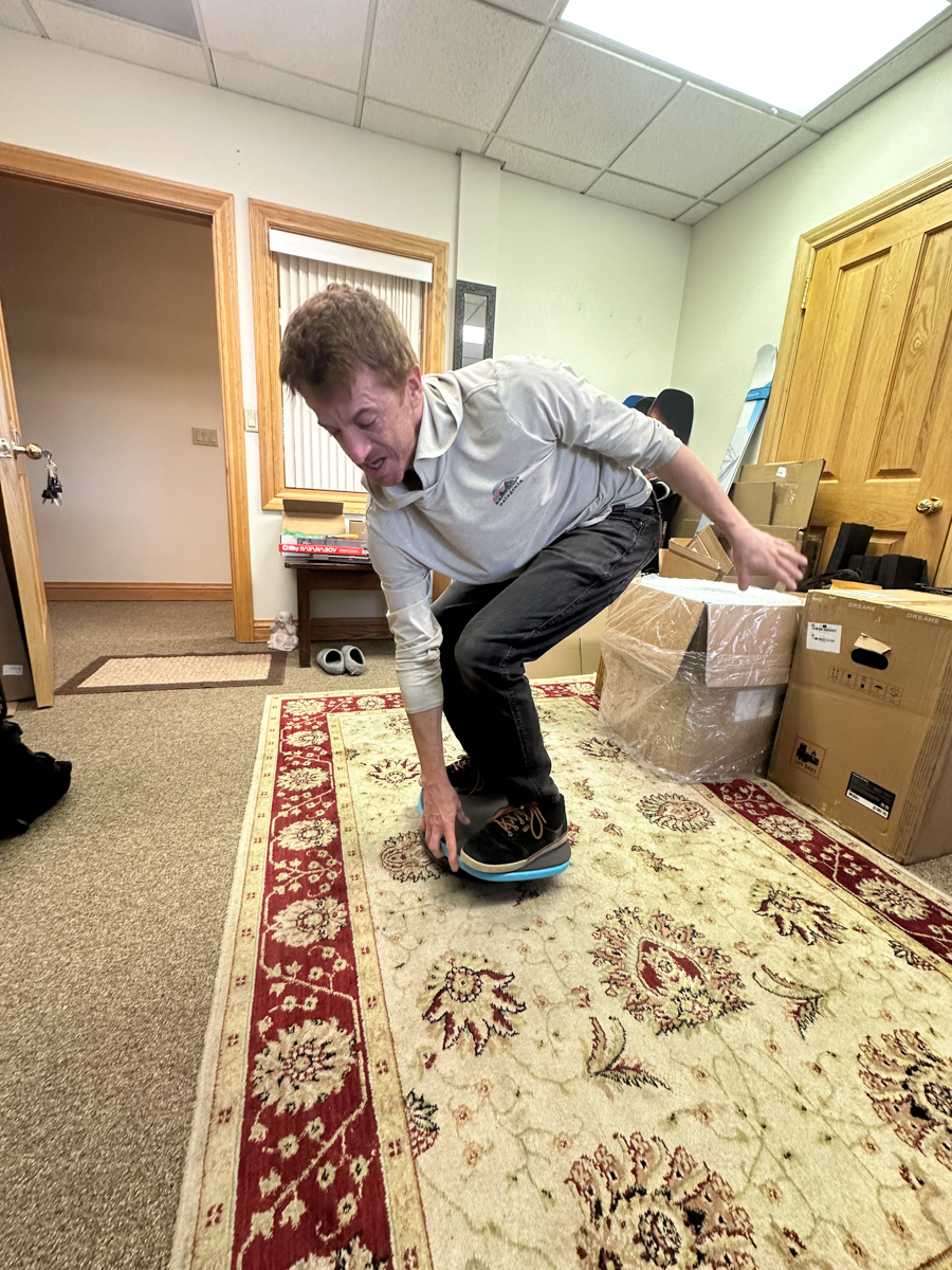 Snowboarder Doing Grabs on Land