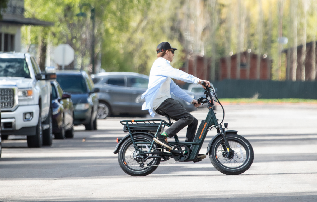 Man Riding E-Bike to Work