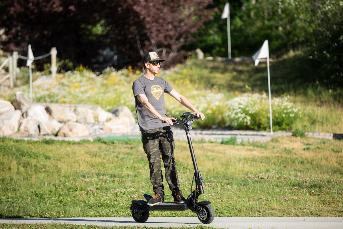Man Riding Safely on E-Scooter