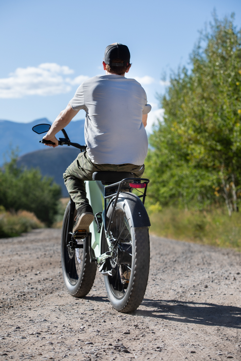 Man Sitting on E-Bike