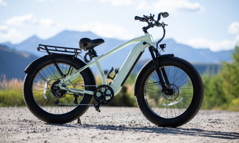 Qronge Thunder E-Bike Review: A Powerful Commuter that Won’t Break the Bank Green Qronge Thunder Fat Tire E-Bike in Jackson WY with Mountains in Background