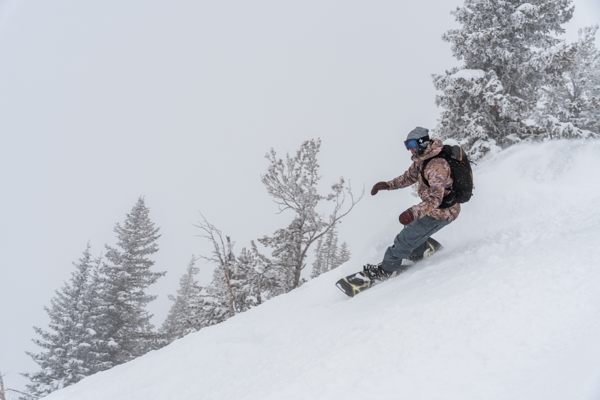 Man Making Snowboard Turn
