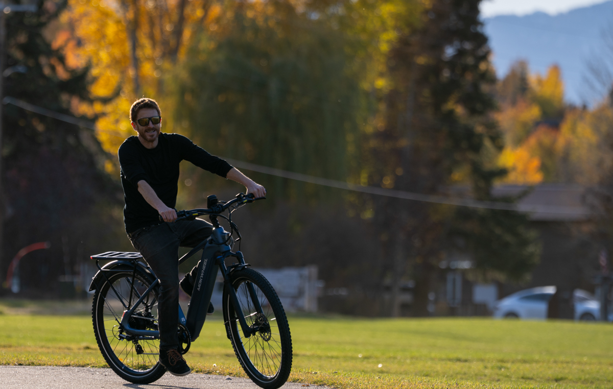 Man Riding E-Bike in Fall Weather