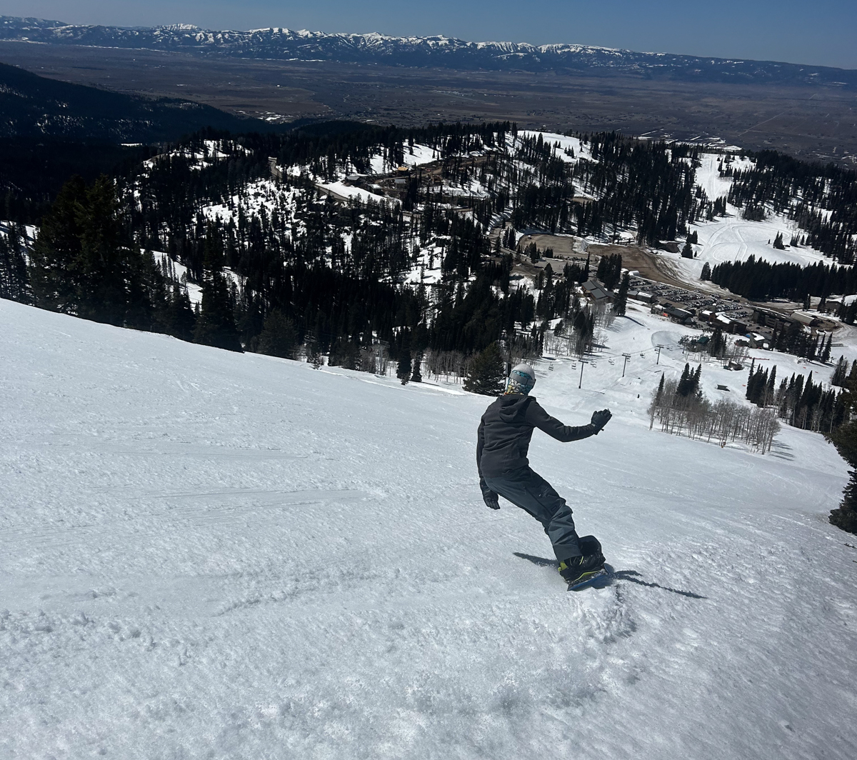 Man Snowboarding Downhill Make Healside Turn