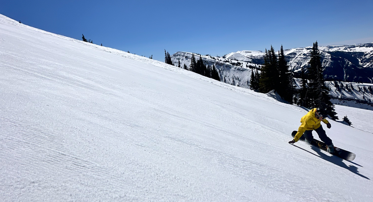 Man Riding Snowboard Fast