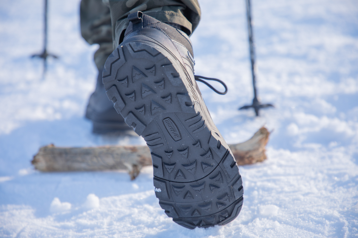 Man Walking on Snow and Ice