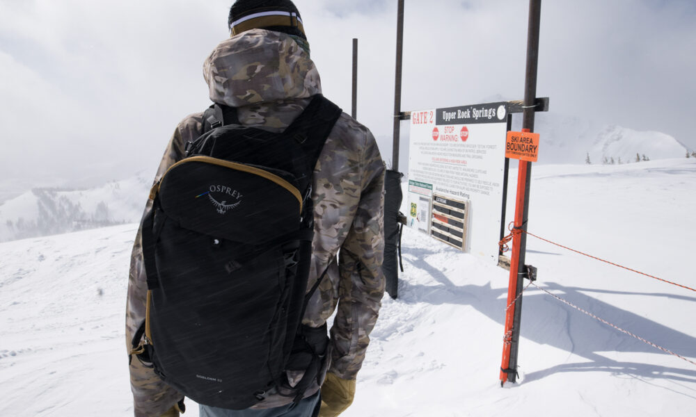 Jackson Hole Backcoutnry Snowboarder about to Leave Gates