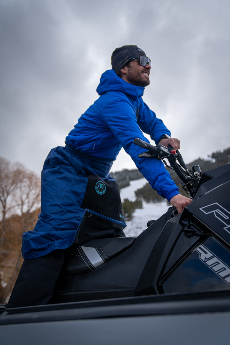 Man Wearing Mozy Blanket with Mozy thermal wrap in walking mode with corners tacked up for mobility