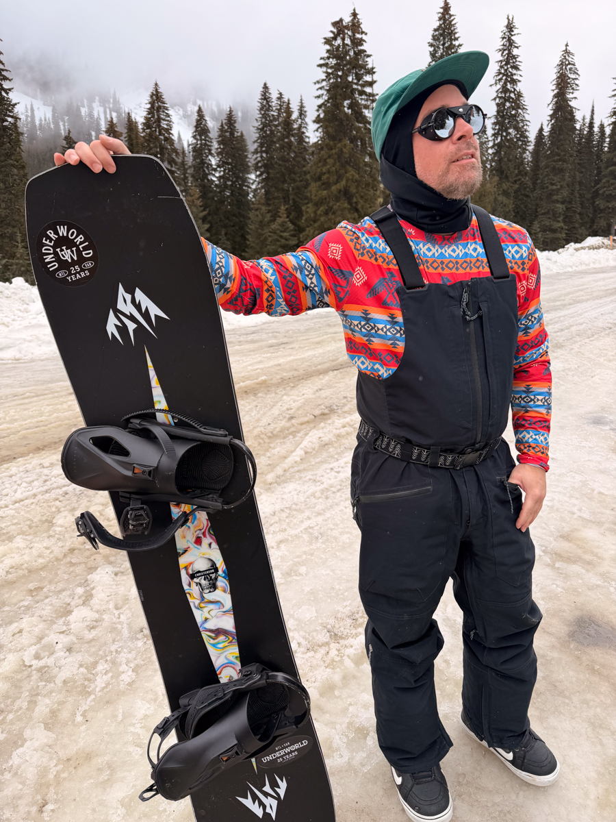Dude Hanging with Snowboard in Sunglasses