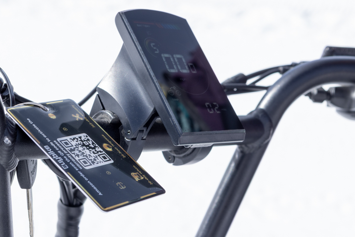 Close-up detail of the digital LCD display and handlebars on the Euybike K6 Pro e-bike.