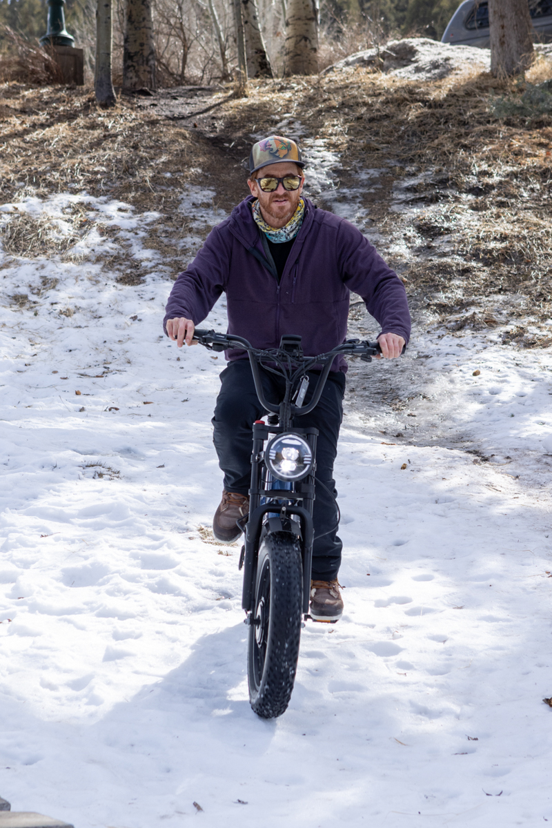Front view of a rider navigating a snowy dirt path on the Euybike K6 Pro fat tire electric bike in Wyoming.