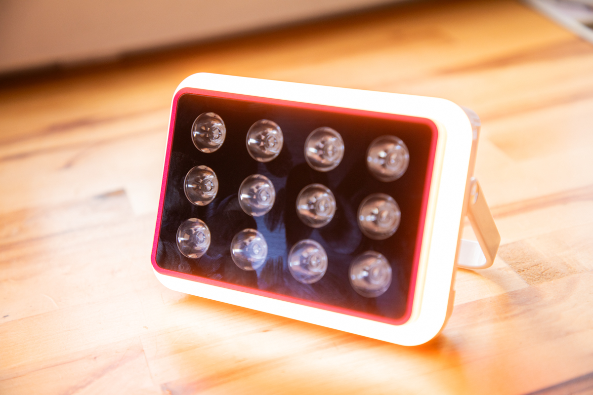 The MitoPRO Mobile Portable Red Light Therapy Device Shown from the Front with its Sleek Ergonomic Design and Built-in Stand