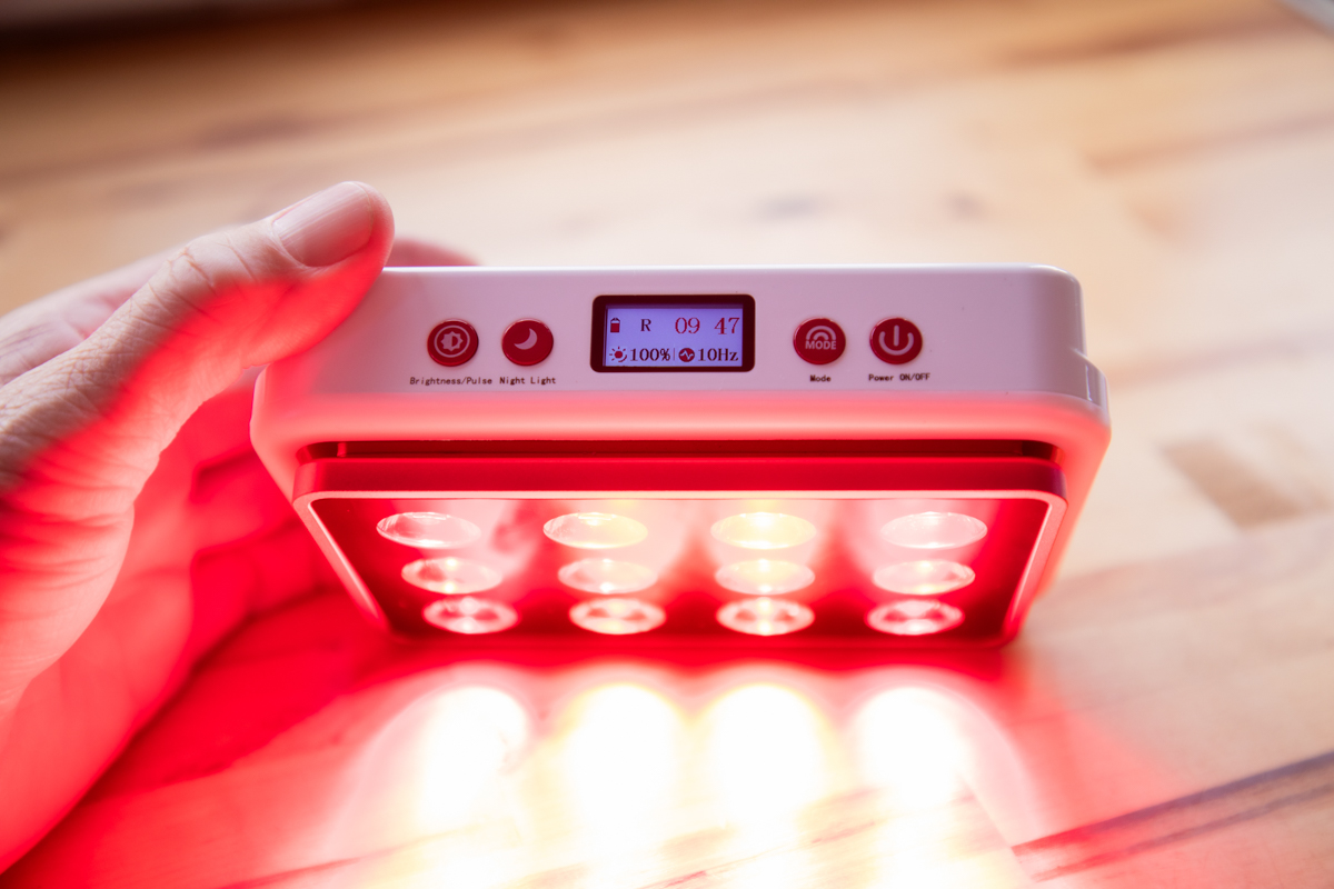 The MitoPRO Mobile powered on, displaying the five-wavelength LED array for red and near-infrared light therapy