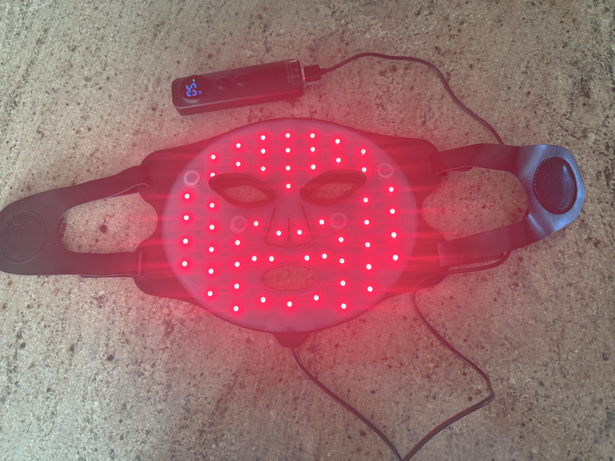 The EZ-Life red light therapy mask laid flat showing full array of red LED lights