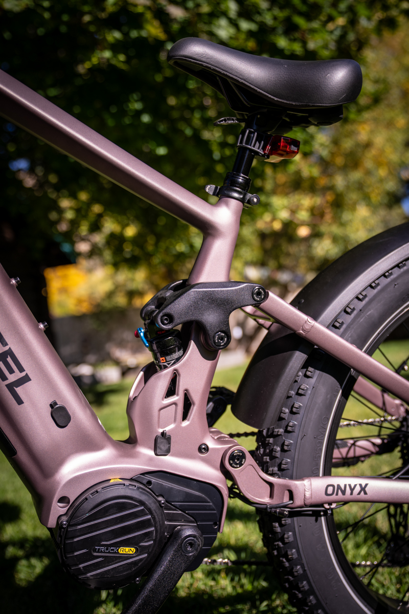 Close-up technical view of the powerful high-torque mid-drive motor on the full-suspension Mokwheel Onyx e-MTB.