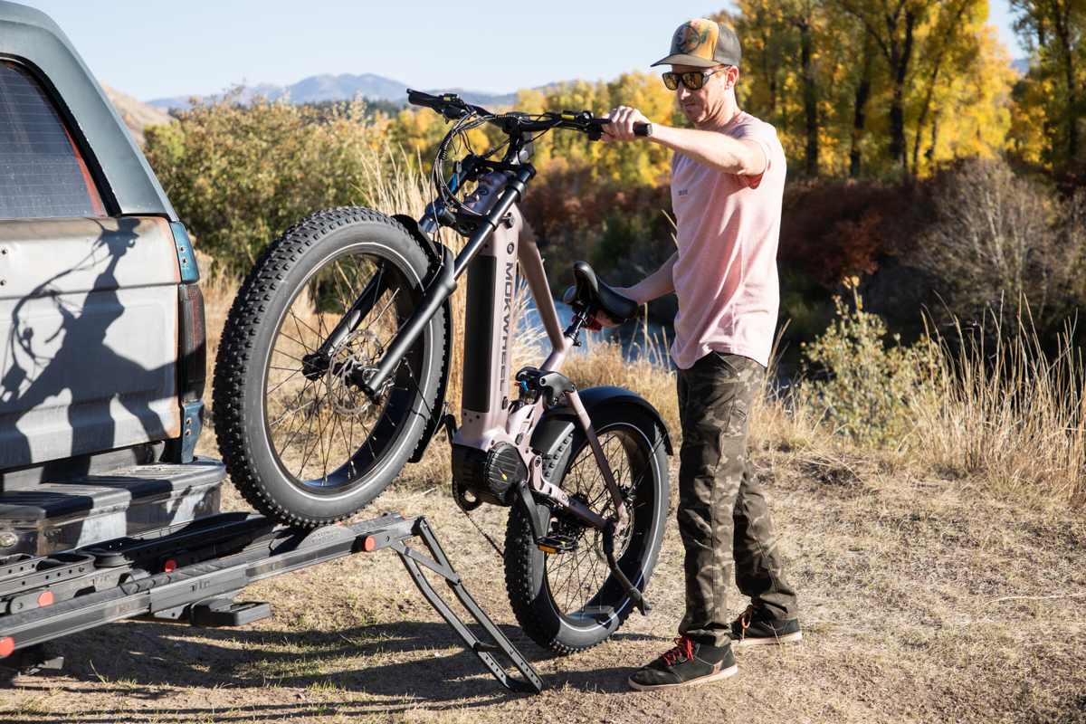 Loading the heavy duty Mokwheel Onyx e-bike onto a hitch-mounted truck rack before heading into the remote Teton wilderness for testing