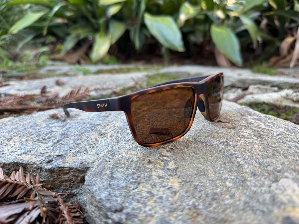 Smith Riptide sunglasses with brown performance lenses resting on rock in Southern California, highlighting nose grip, lens clarity and secure fit | Photo David Undercofler Mountain Weekly News