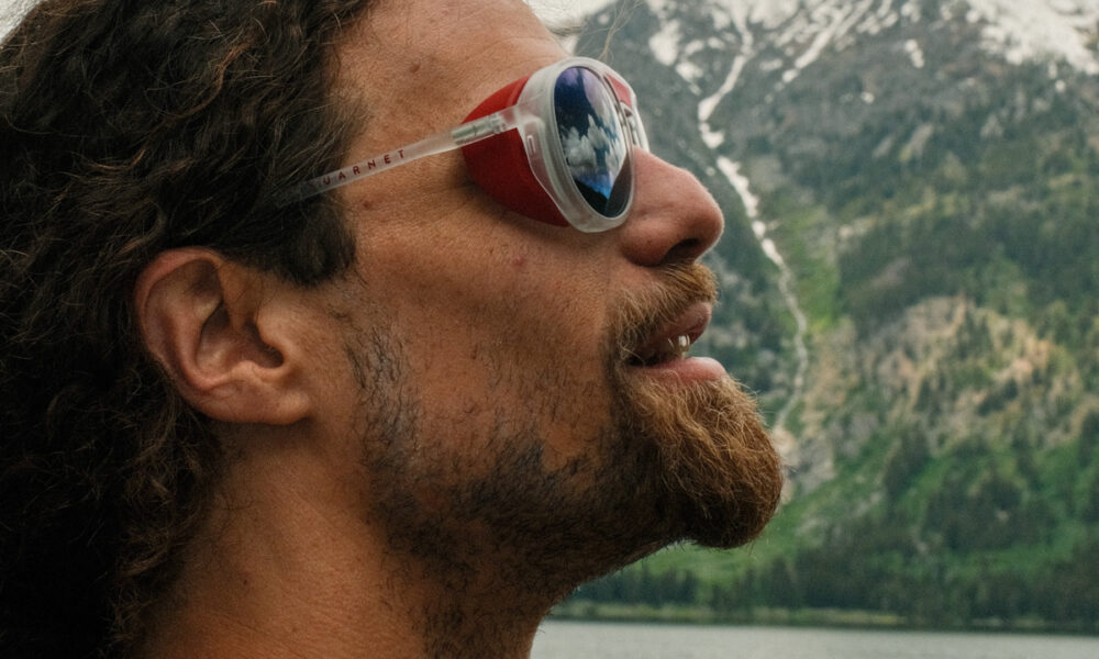 Pat Kinney wearing Vuarnet Ice Round sunglasses in alpine terrain in the Tetons