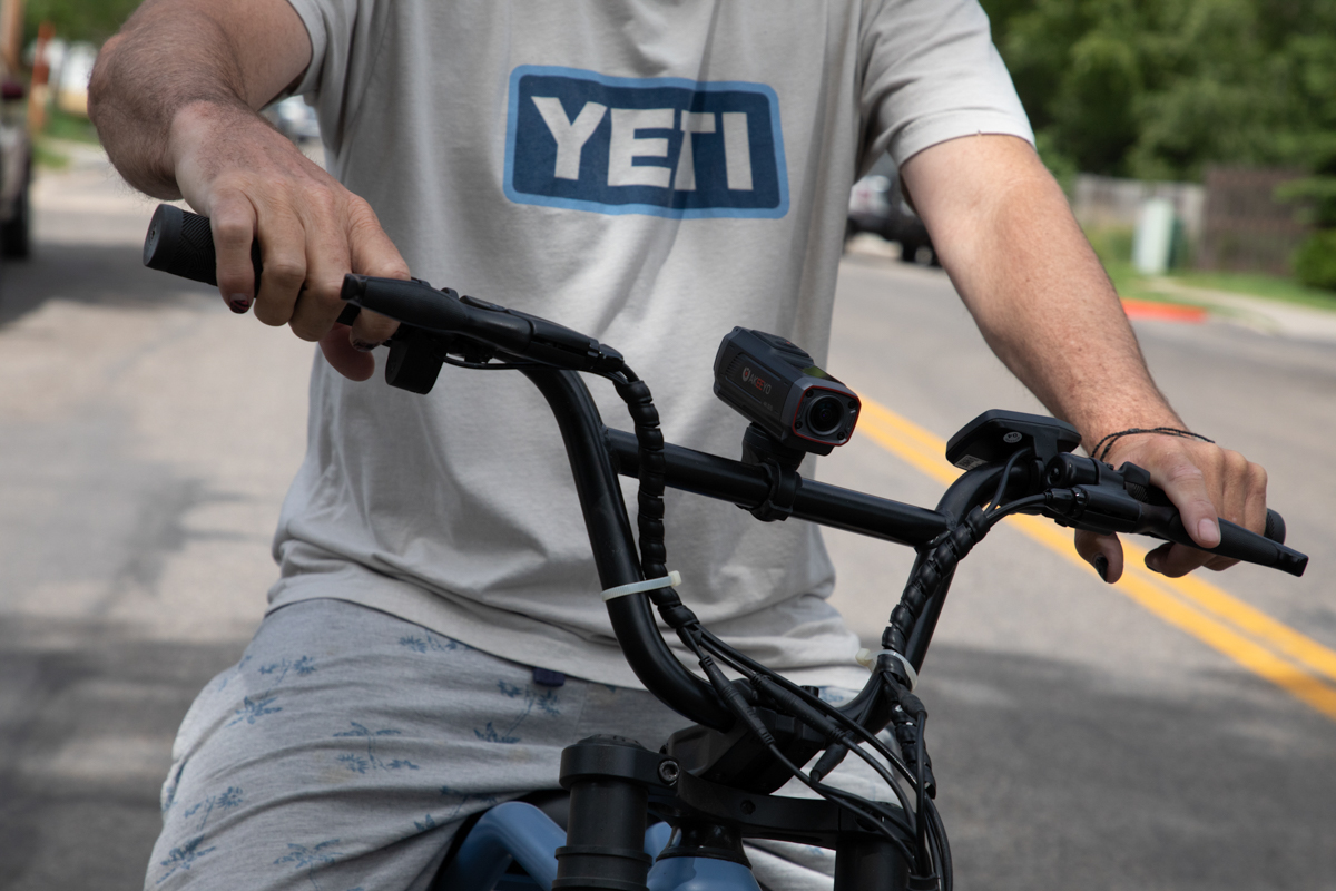 Rich Goodwin riding an e-bike with the AKEEYO AKY-730PRO mounted to the handlebars