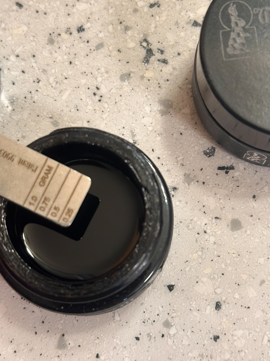 Pürblack True Gold shilajit resin with included dosing tool used to measure servings
