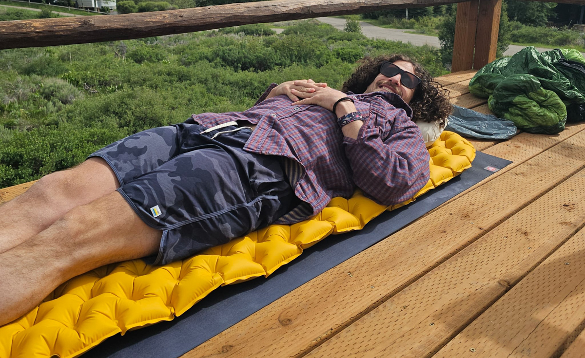 Pat Kinney testing the Sea to Summit Ultralight XR Sleeping Pad and Aeros Pillow at home before a backcountry adventure
