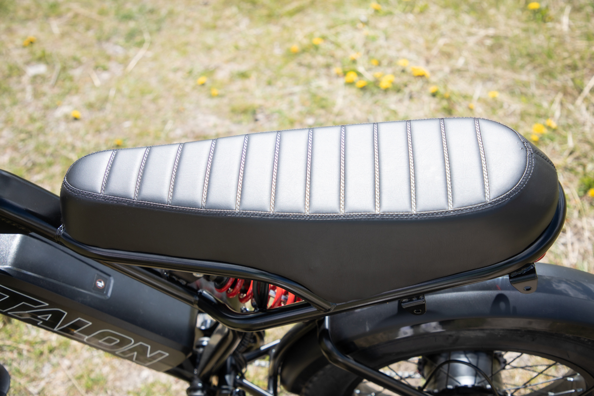 Closeup of the Talon T757 long bench seat showing comfort-focused moped style design