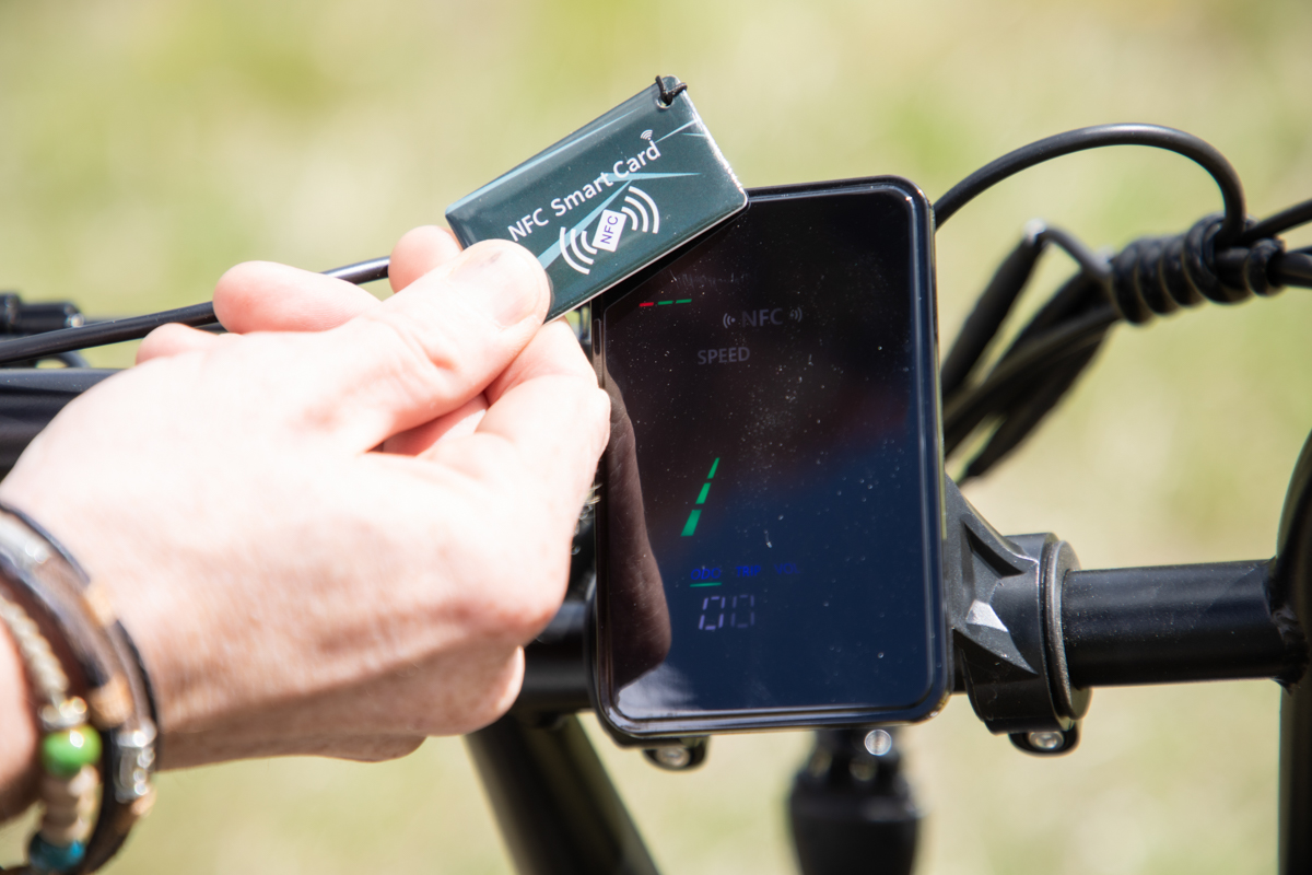 Closeup of the Talon T757 NFC unlock system and color display screen during TETON Tested riding in Jackson Hole Wyoming