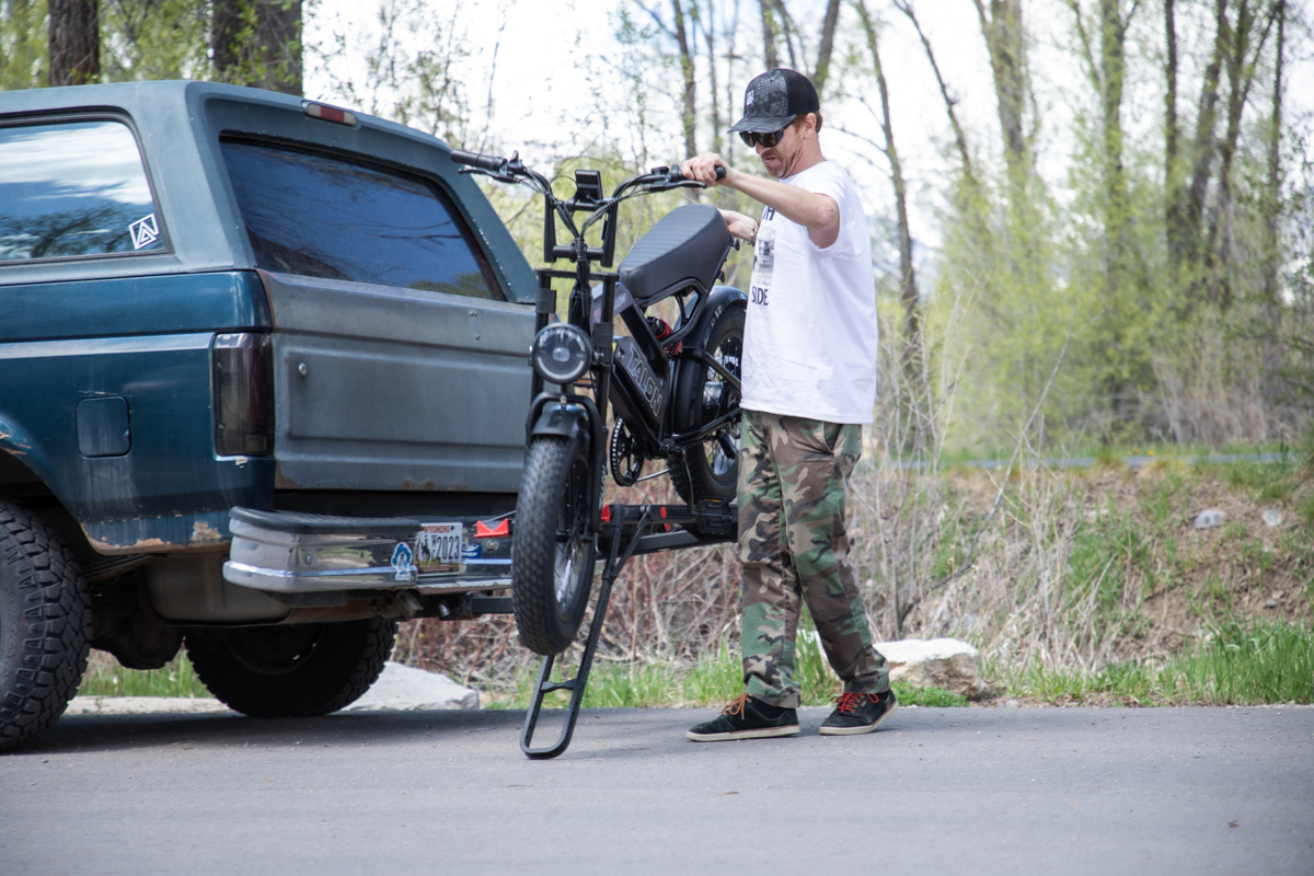 Mike Hardaker loading the Talon T757 electric bike onto a vehicle rack in Jackson Hole Wyoming