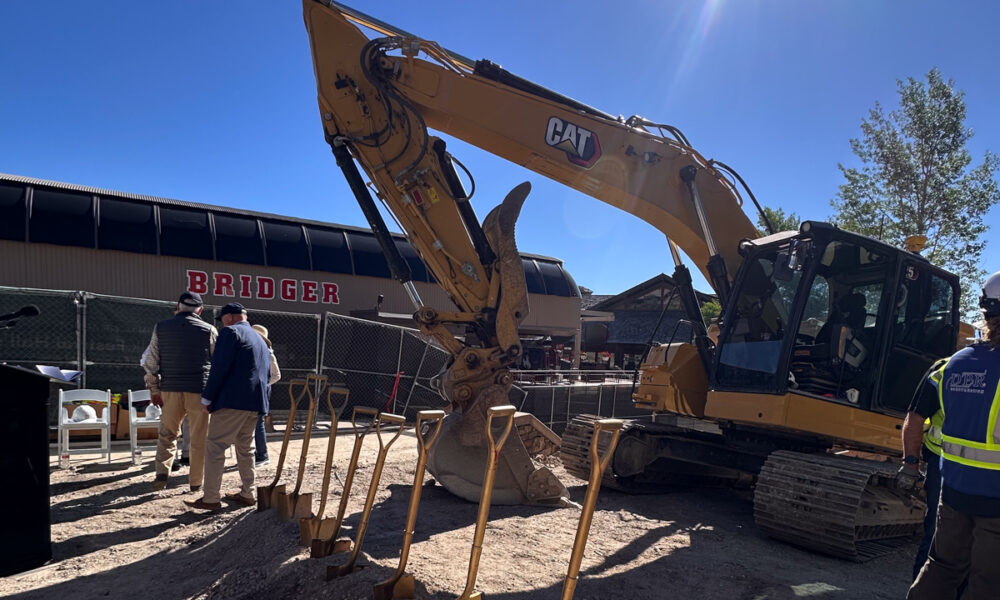 Walk Festival Hall renovation underway in Teton Village with Jackson Hole Mountain Resort visible in the background
