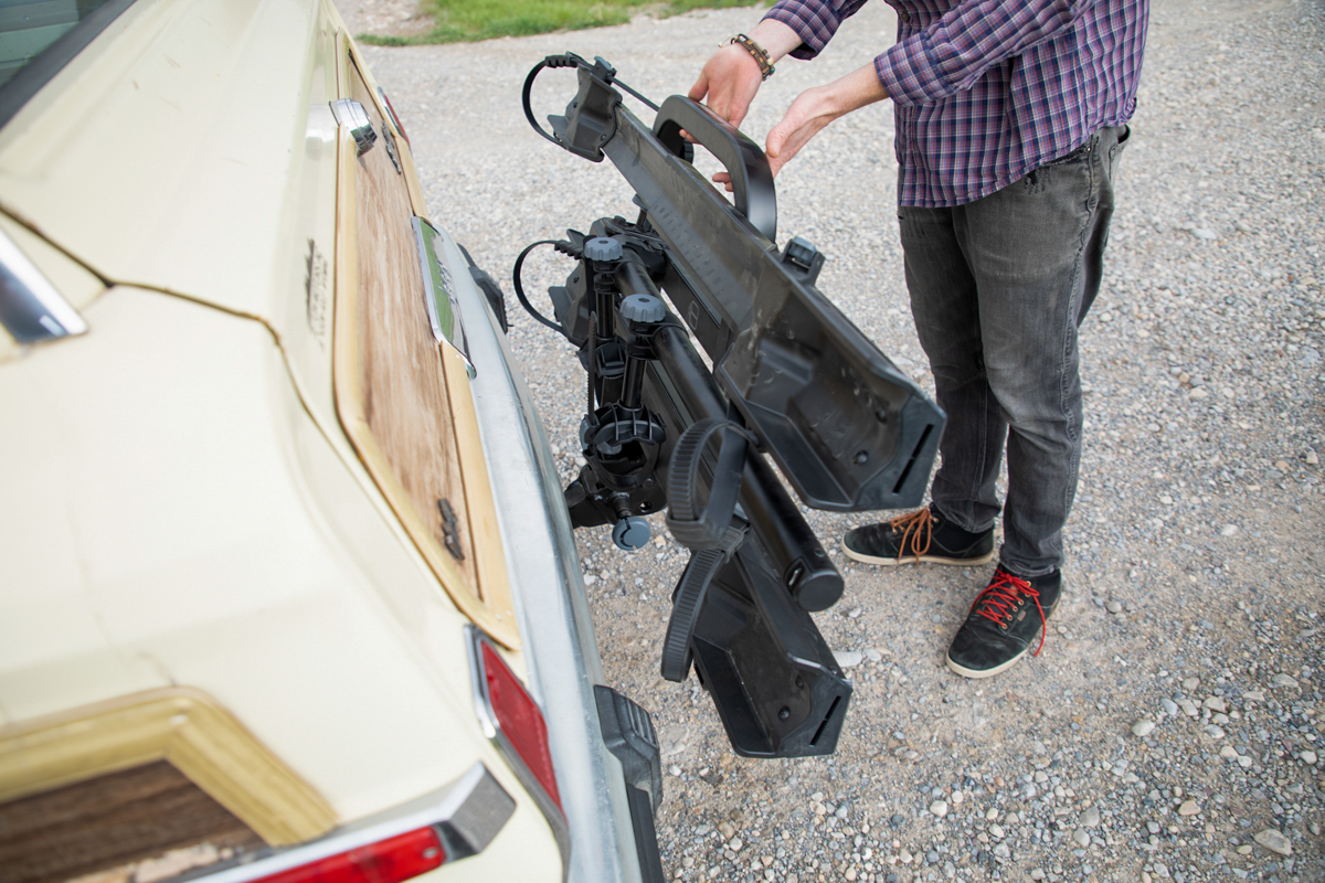 Mike Hardaker operating the Yakima OnRamp LX tilt system for easier rear vehicle access