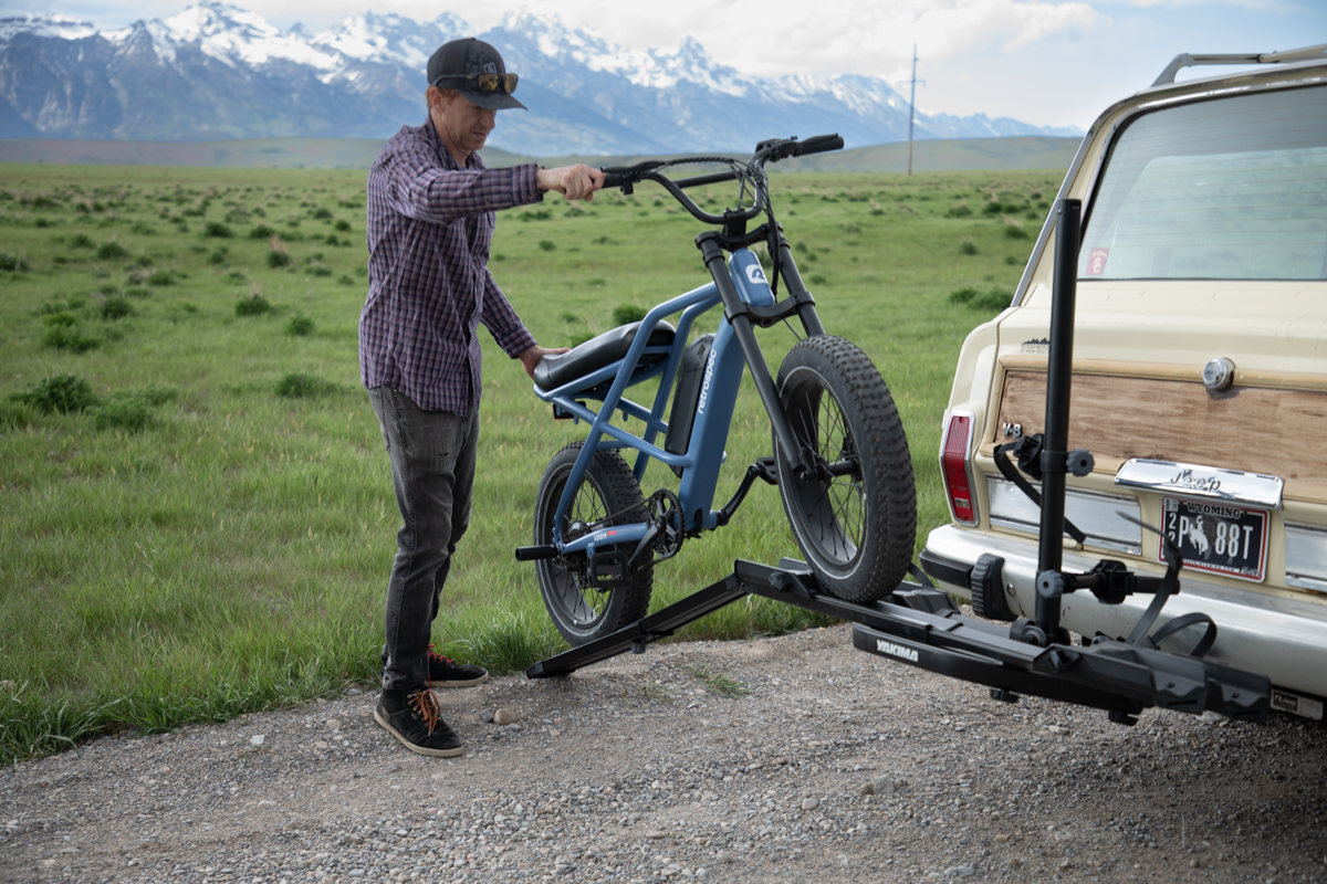 Mike Hardaker loading a Grizzly Woody fat tire e-bike onto the Yakima OnRamp LX using the integrated ramp