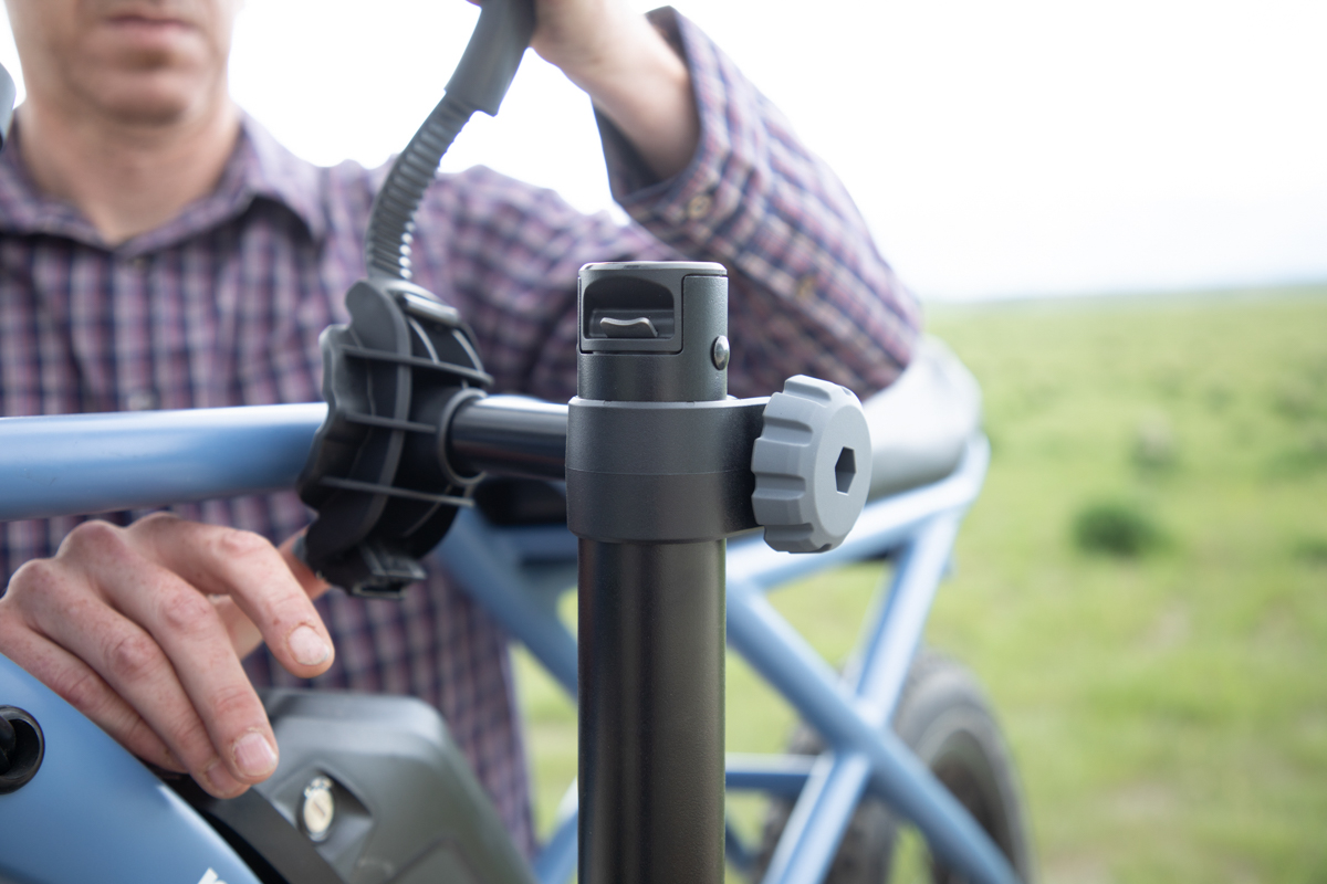 Mike Hardaker securing an e-bike to the Yakima OnRamp LX adjustable frame clamp system