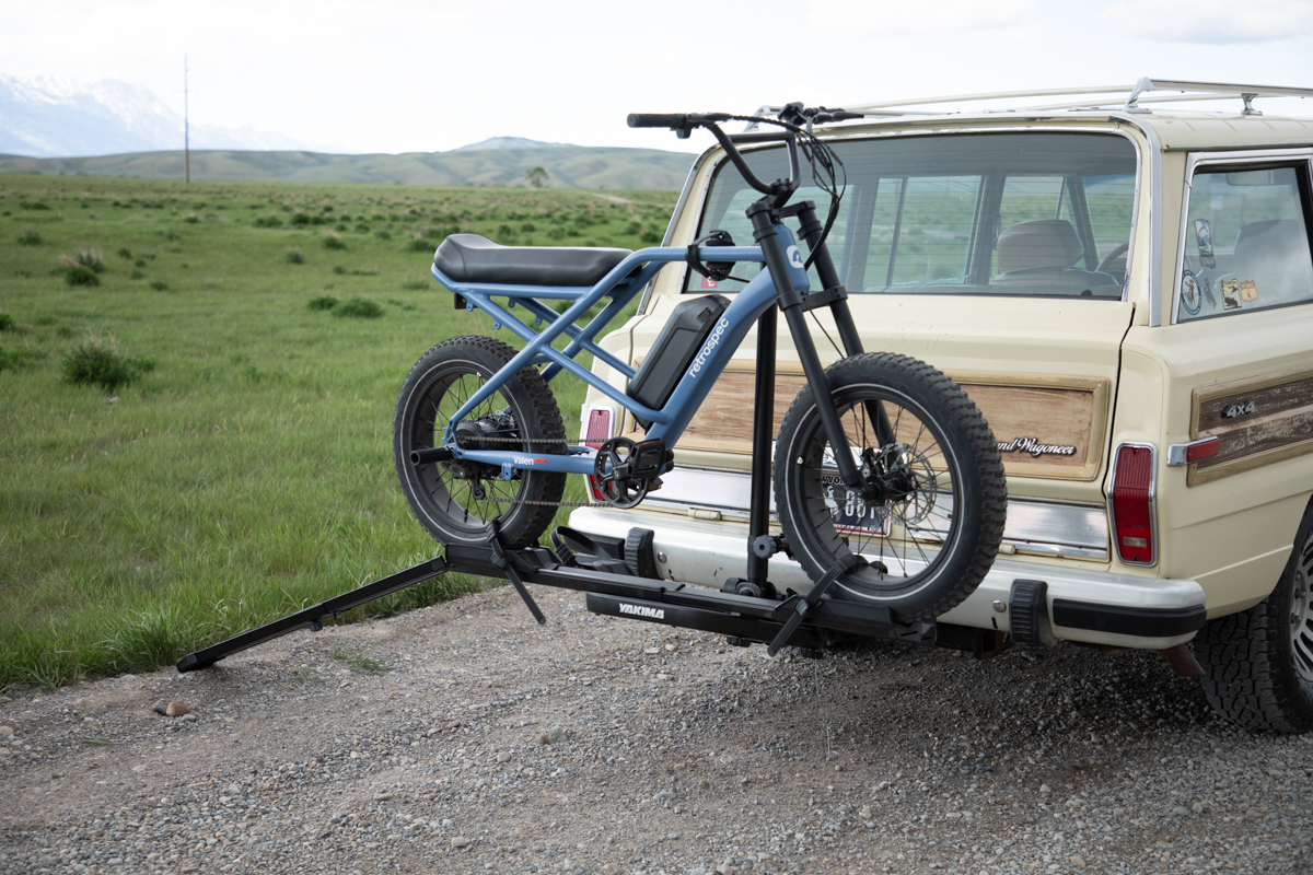 fat tire e-bike secured to the Yakima OnRamp LX bike rack beside a 1988 Jeep Grand Wagoneer