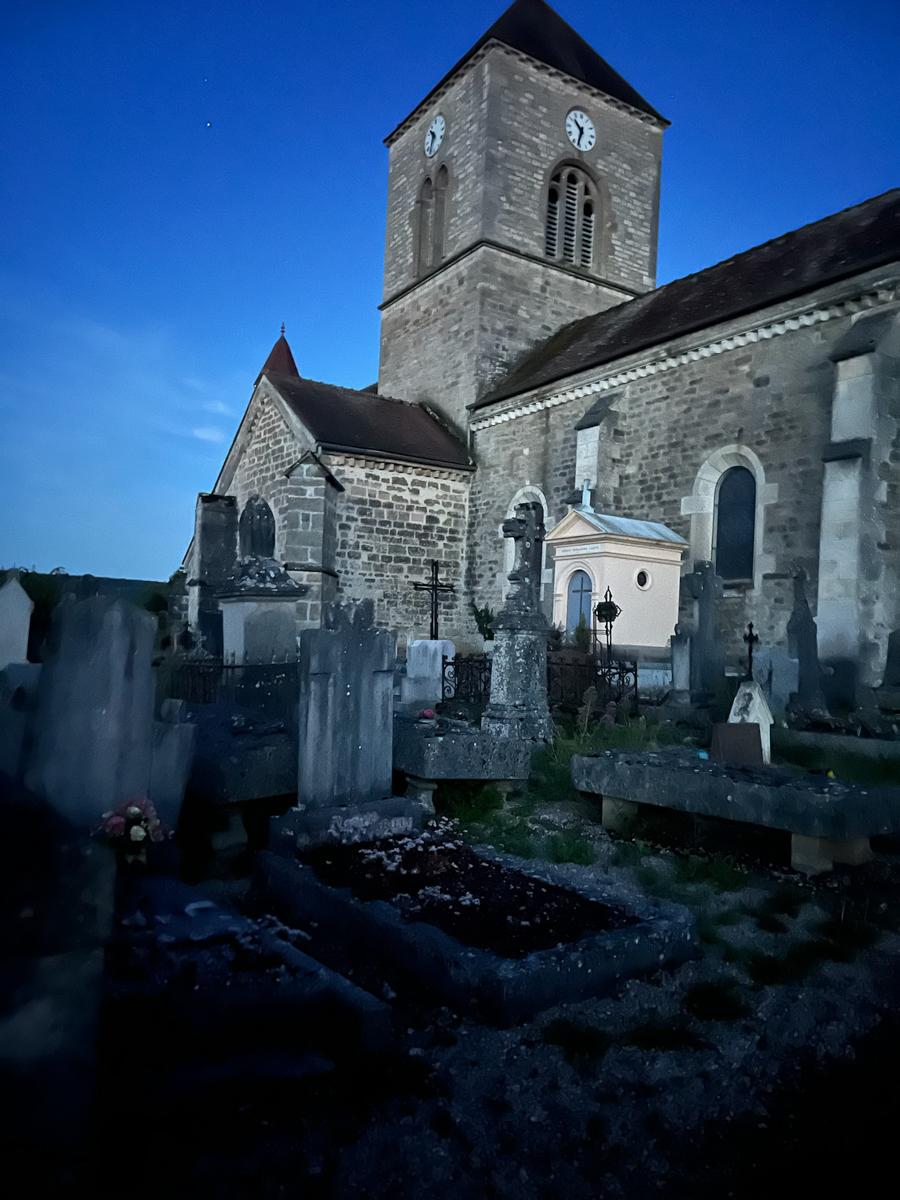 An ancient medieval village at night on the Burgundy Canal