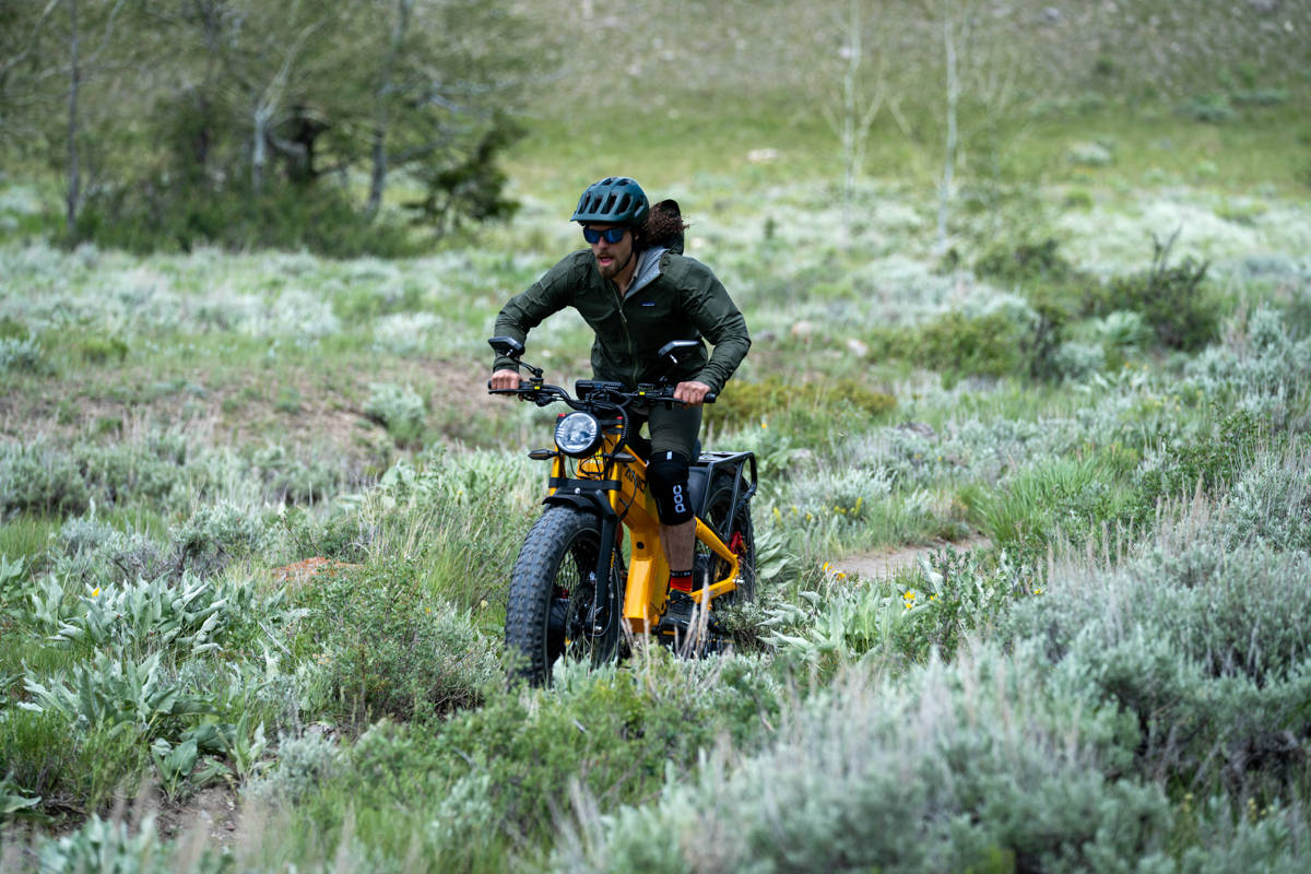 Pat Kinney wearing the POC Cularis helmet while riding the Aniioki A9 Pro Max e-bike in Jackson Hole